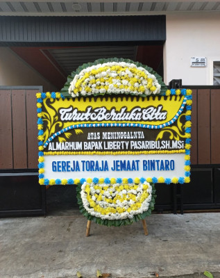 Papan Bunga Duka di Monjok Barat